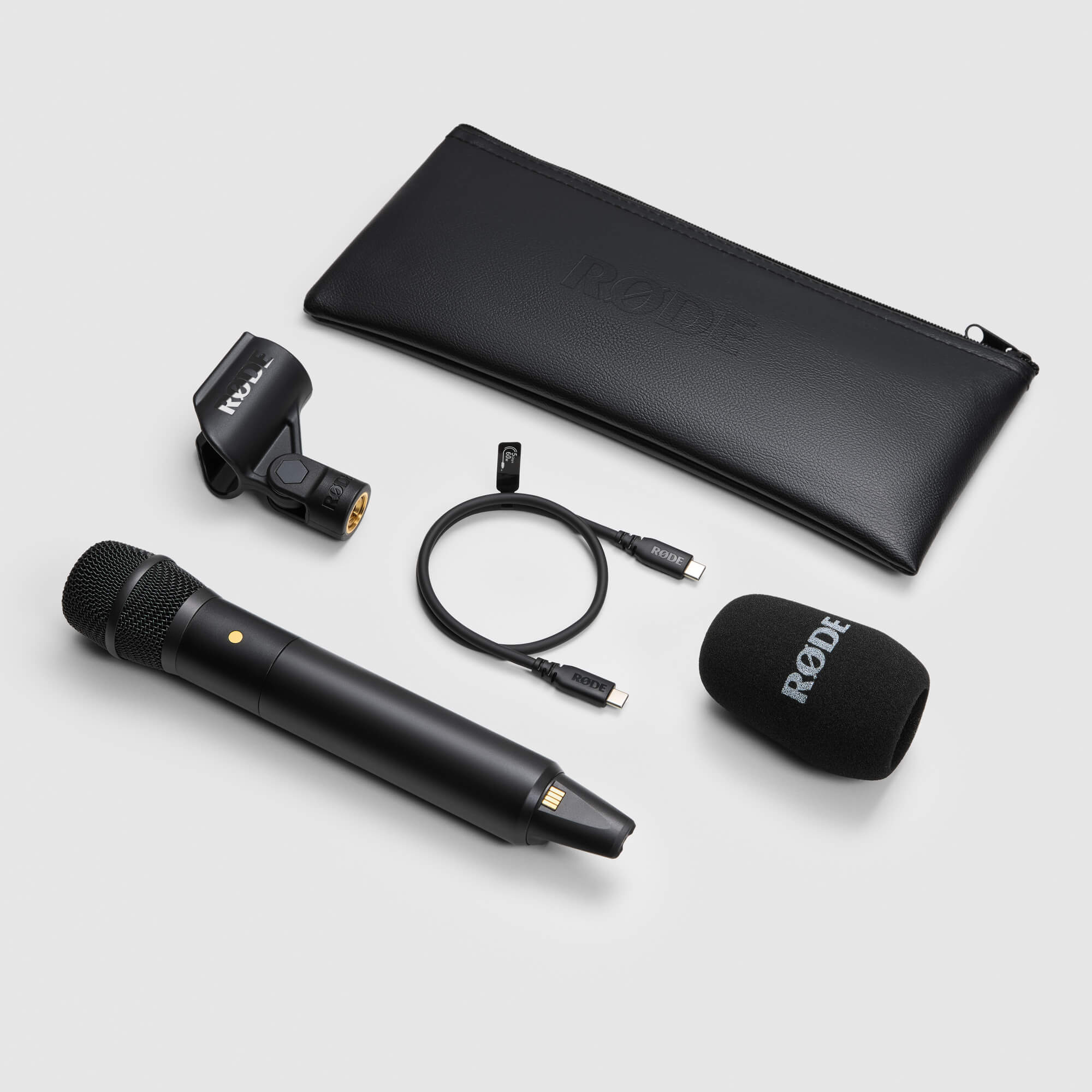 RODE Wireless Handheld Condenser Mic Pro unboxed with receiver, cables and carry pouch included