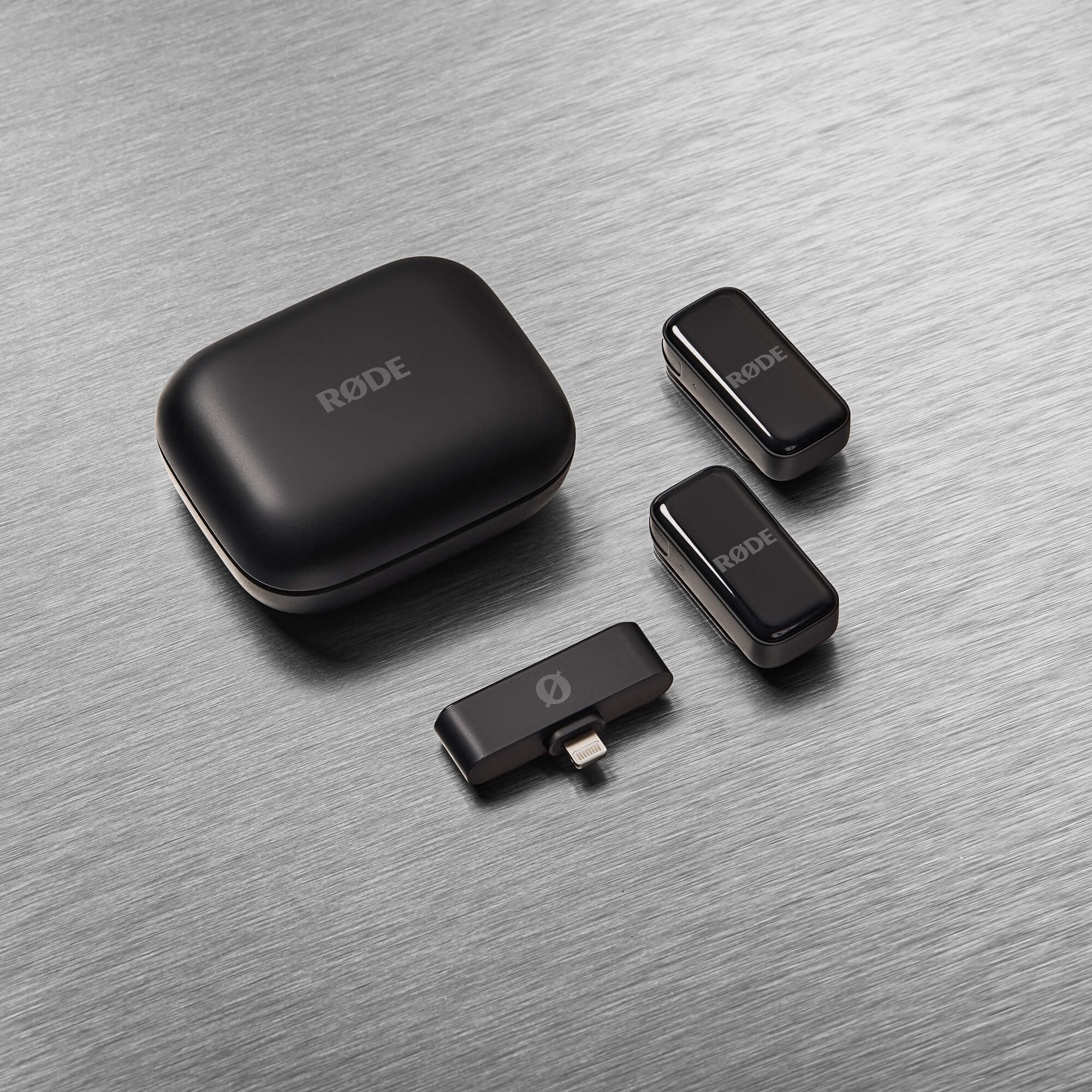 Rode ultra compact black wireless mic USB C port and button close up detail