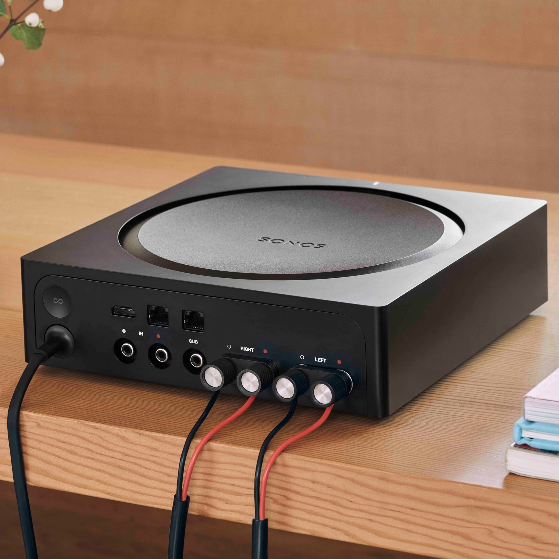 Sonos AMP driving floor-standing passive speakers in a high-end home audio listening room