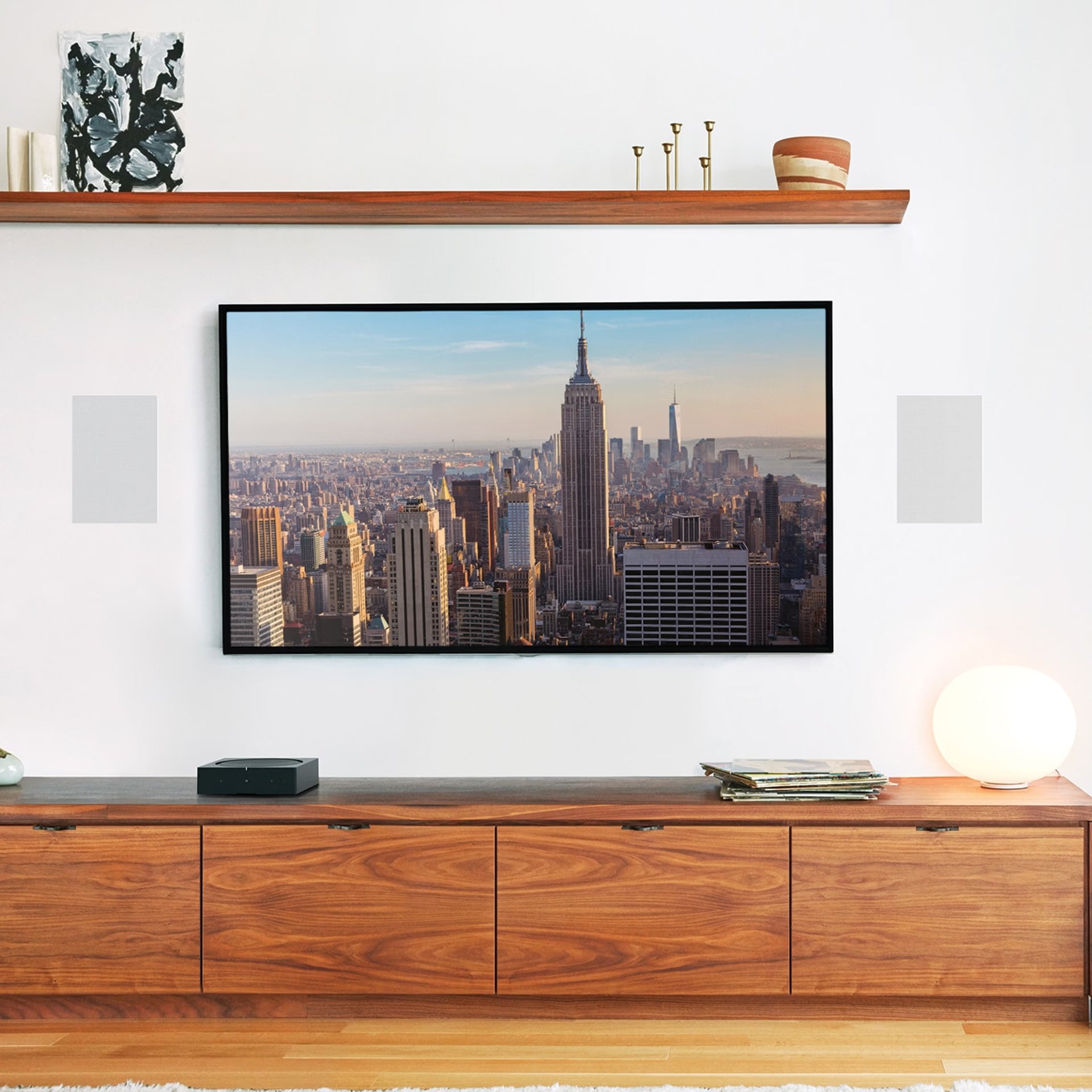 Family enjoying music from Sonos In-Wall by Sonance — invisible HiFi custom loudspeakers flush in wall
