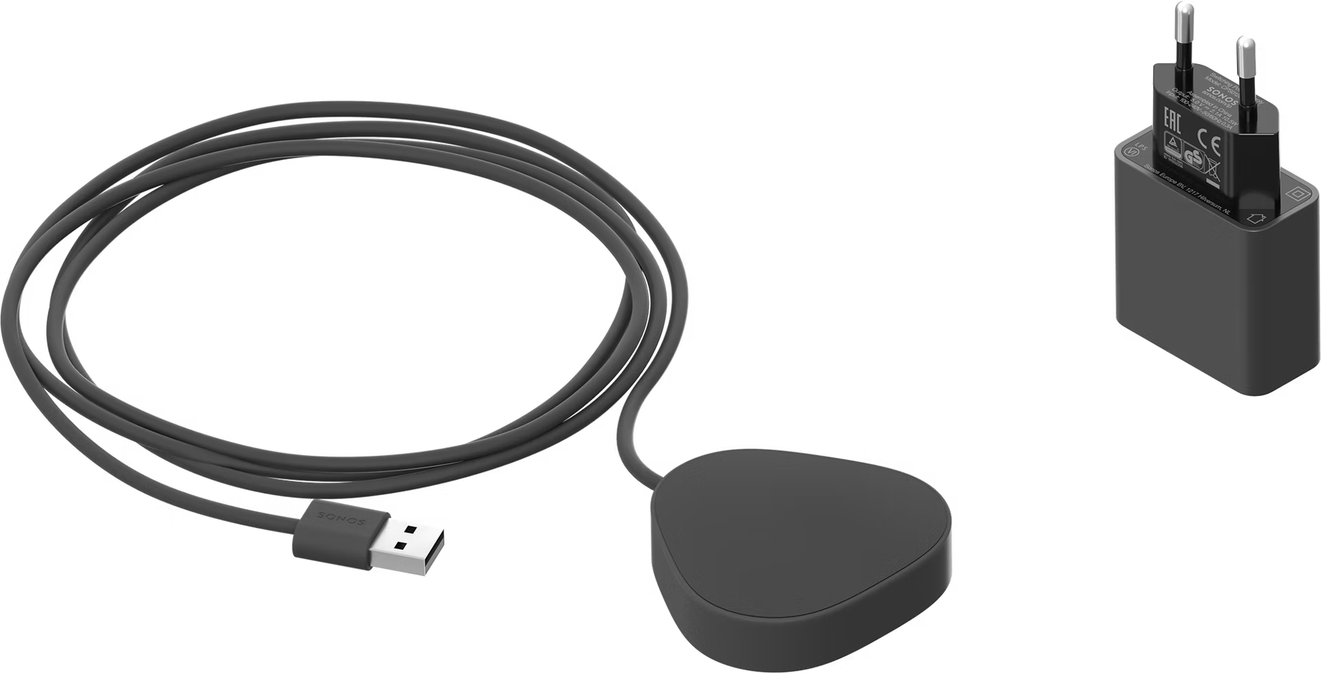 Sonos Roam black charger beside Roam speaker — official wireless charging base and portable HiFi bundle