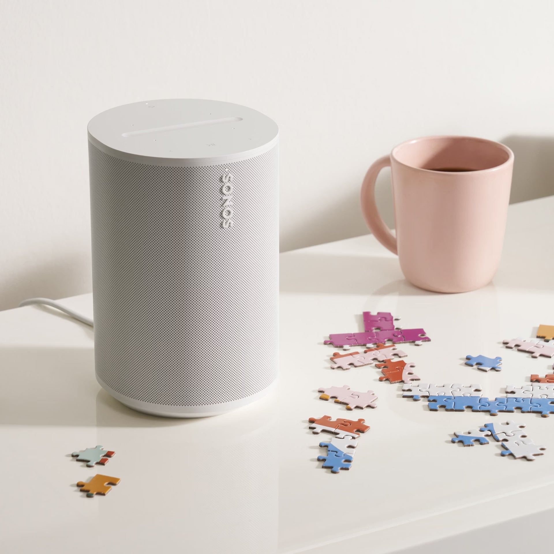 Sonos Era 100 White speakers set up as a stereo for wide immersive home sound