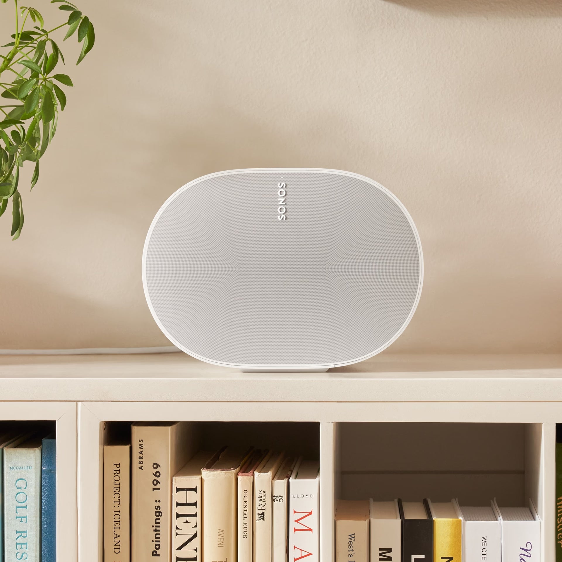 Sonos Era 300 white on desk in minimalist home office for high-fidelity music and spatial audio