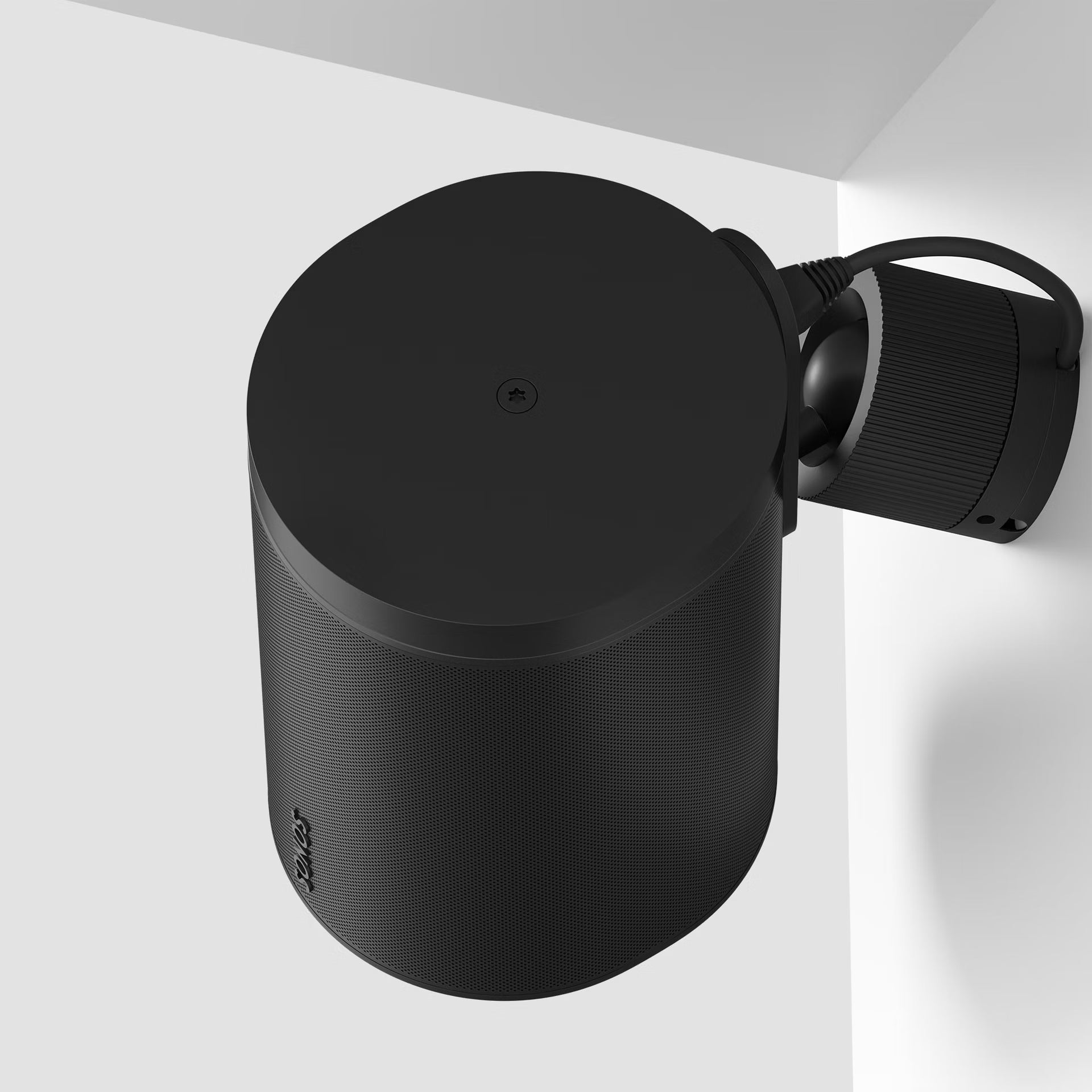 Rear of Sonos Era 100 Pro black surface mount — wall plate with fixing points for secure pro installation