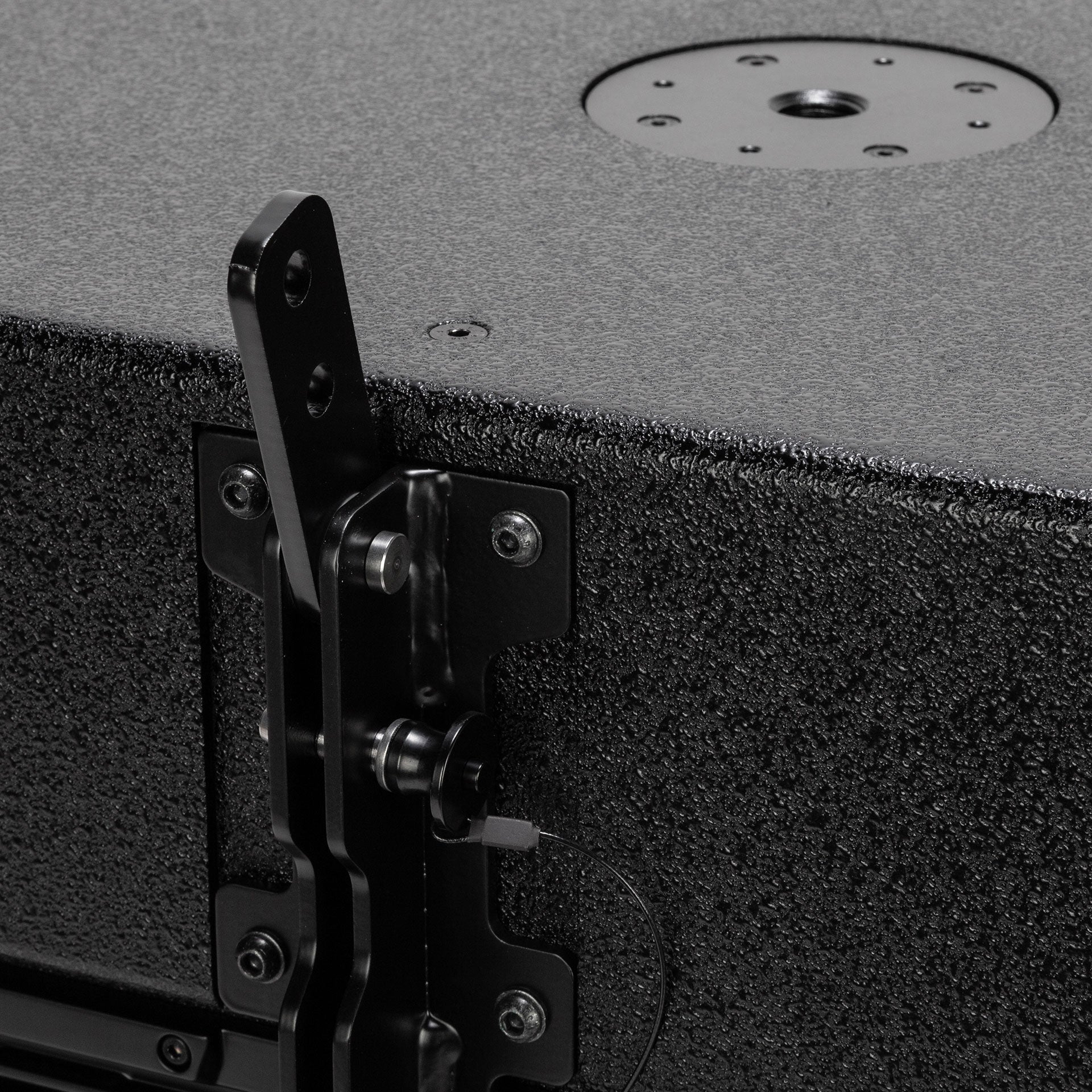 Close-up of RCF HDL 35-AS Active Flyable Subwoofer Module M20 pole-mount thread and rigging pins
