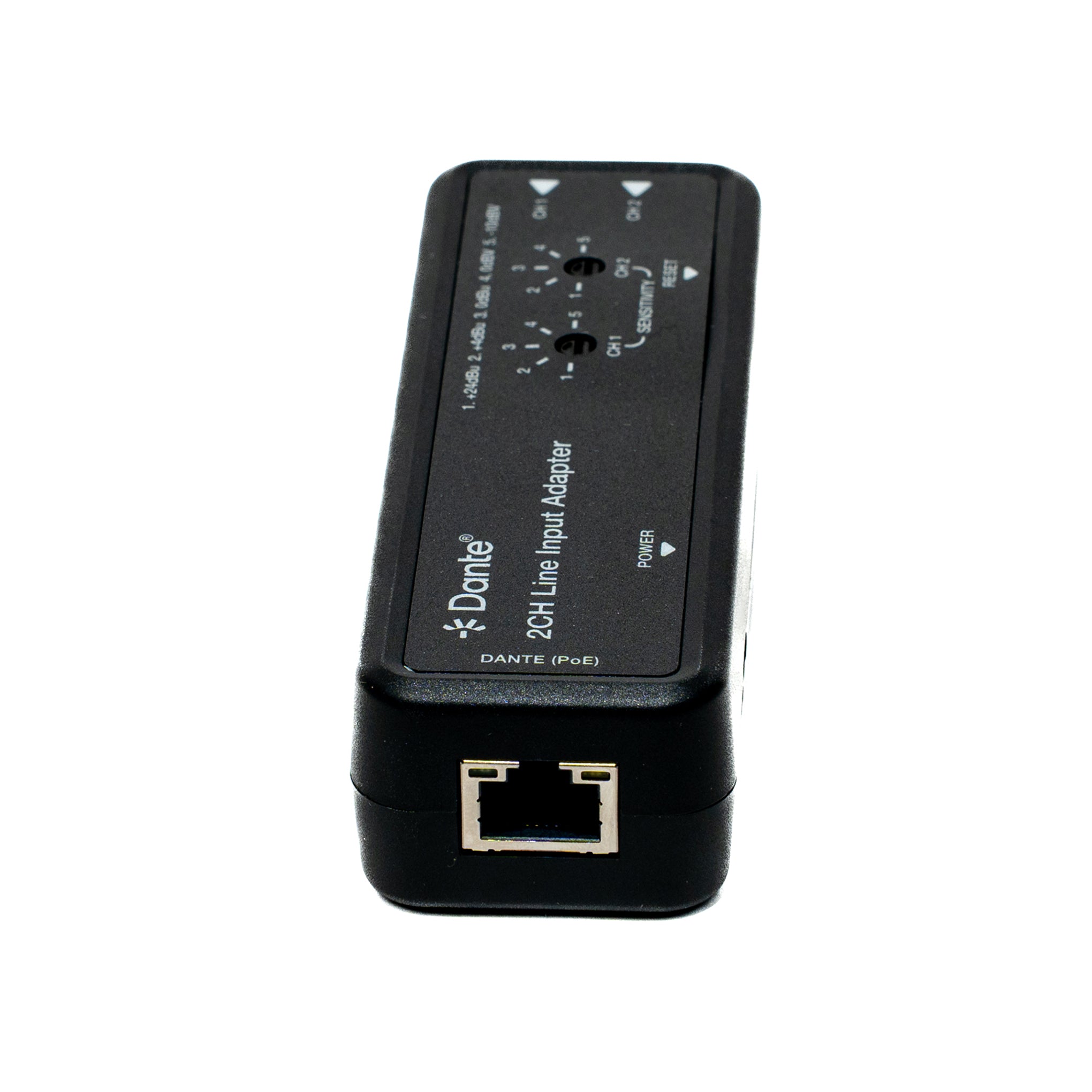 Black audio interface adapter with Dante logo on a white background