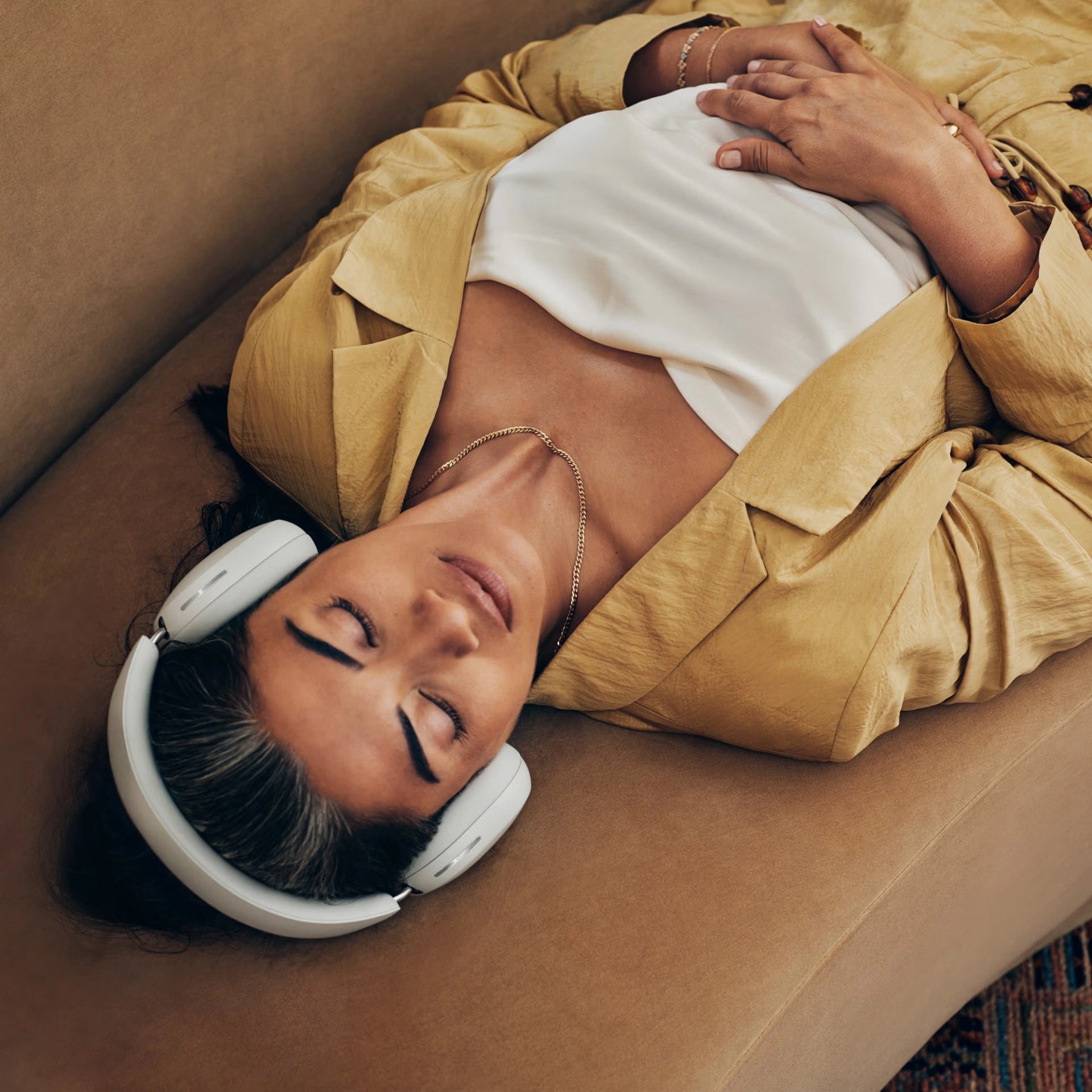 Sonos Ace white headphones worn at desk in home office for focused deep work listening session