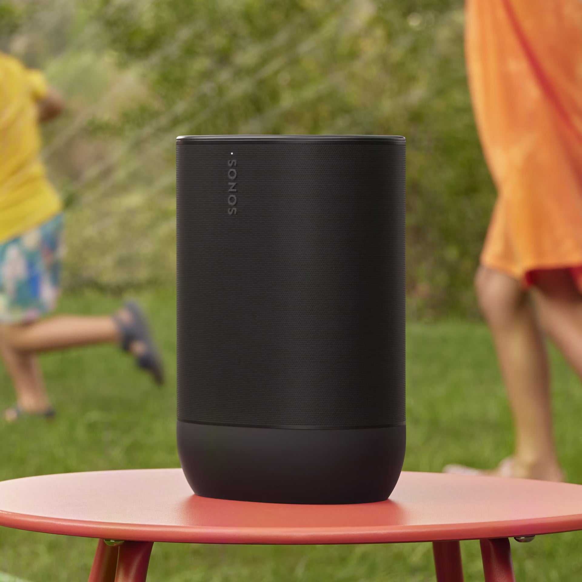 Sonos Move 2 Black weatherproof smart speaker on a patio for all-weather outdoor audio