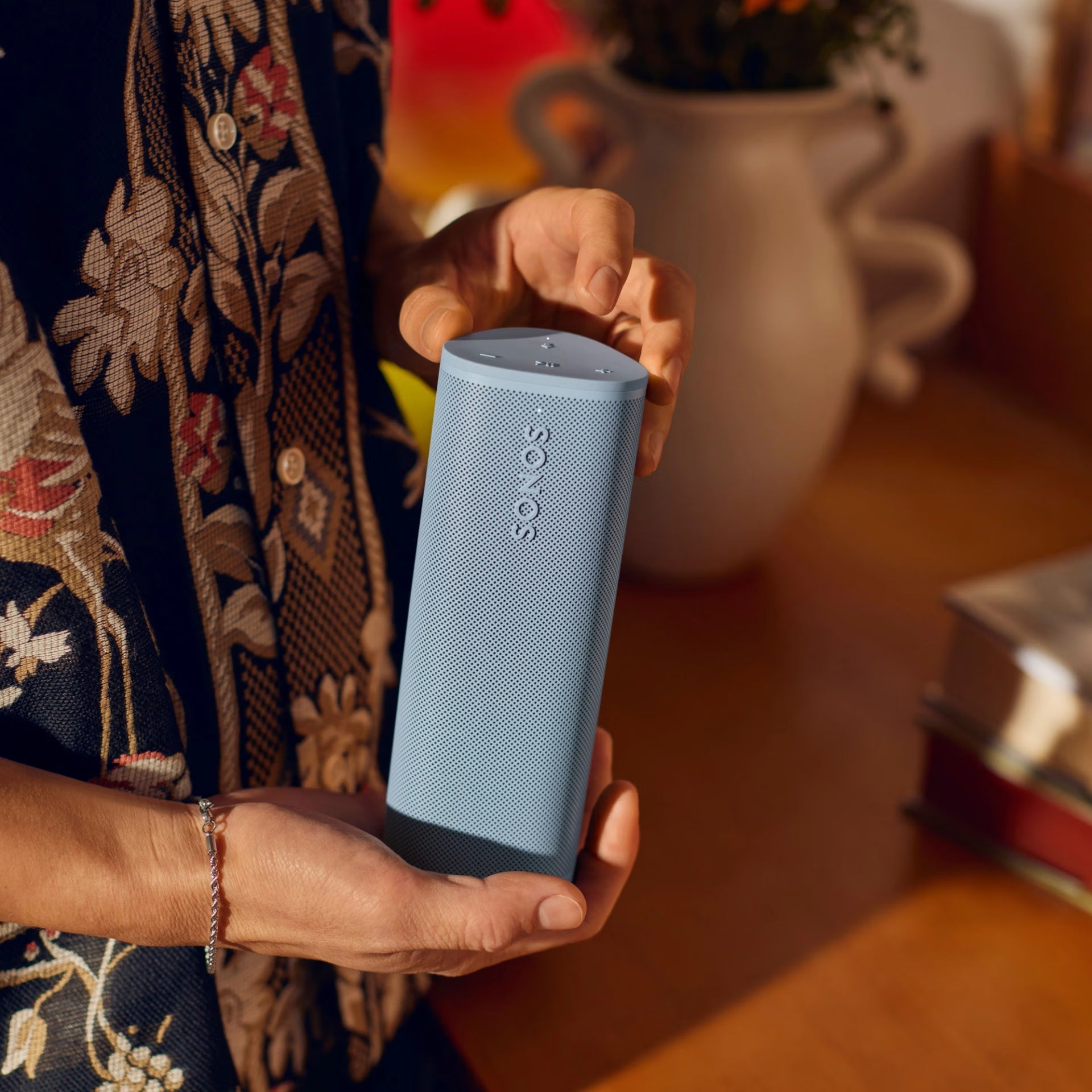 Sonos Roam 2 Blue portable loudspeaker in a travel backpack ready for on-the-go use