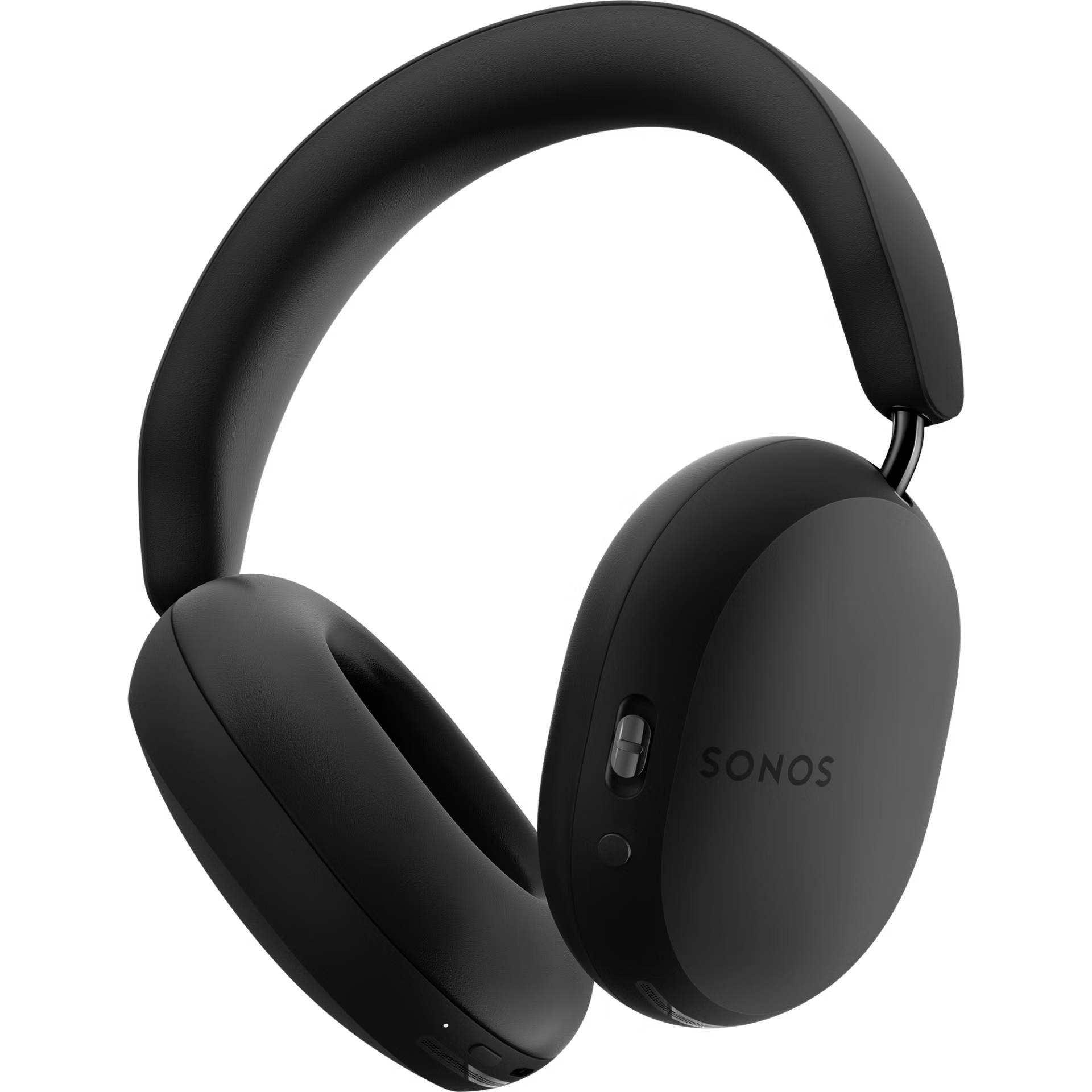 Sonos Ace black resting on studio desk in moody low light showcasing bold premium headphone build